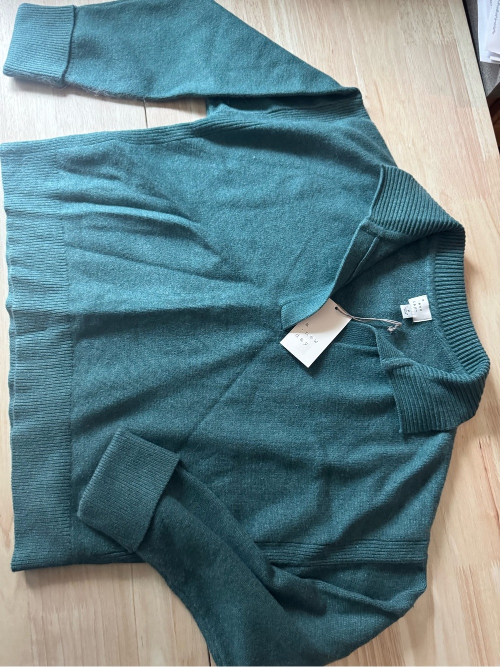 A new day sweater